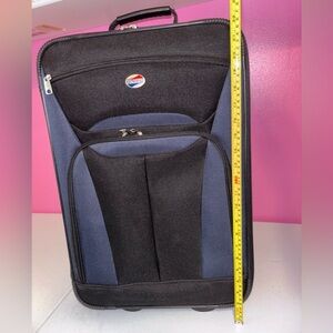American Tourister Black and Blue Travel Bag